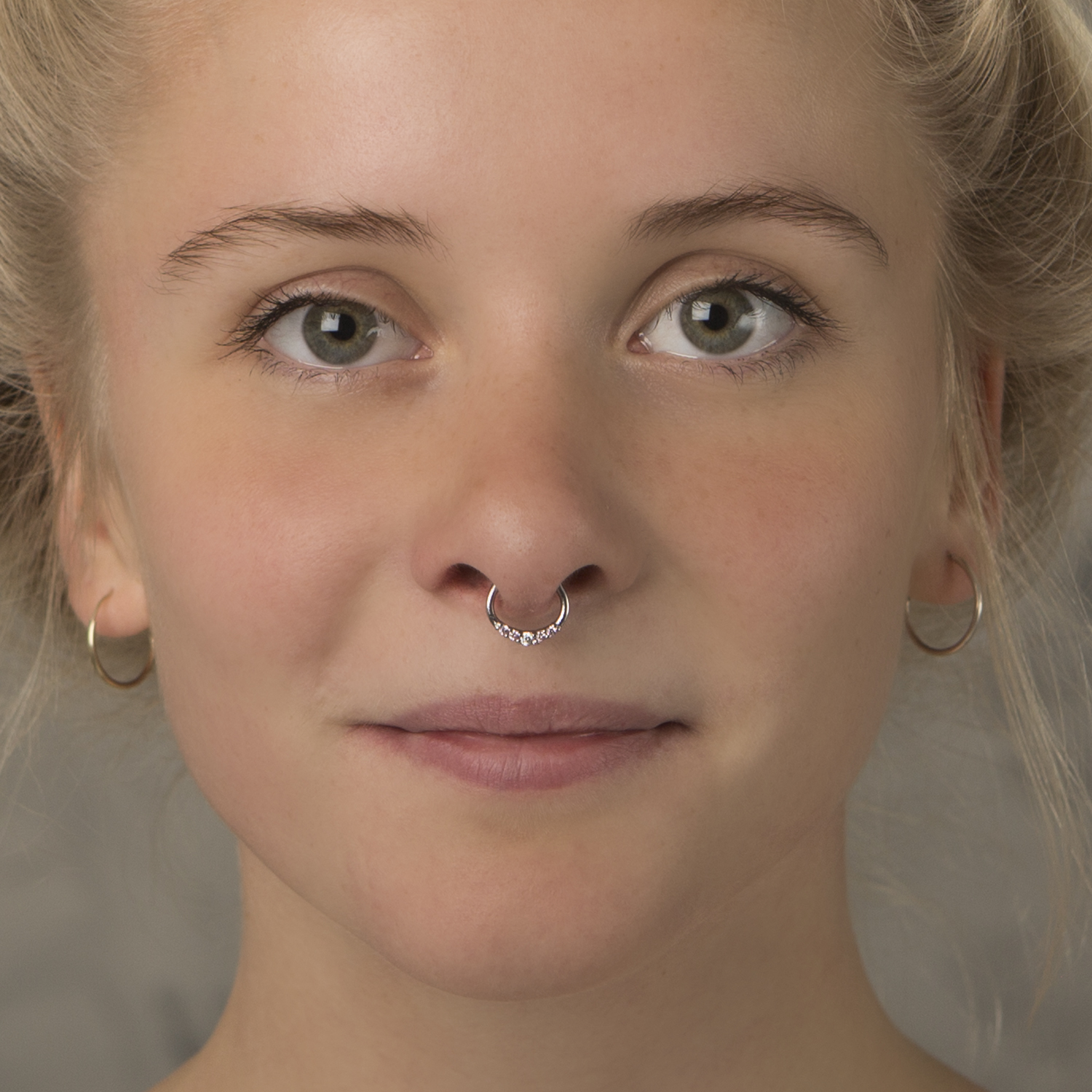 Clicker para el septum con cinco brillantes